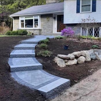 Miller Brothers Masonry LLC mason building cement steps.